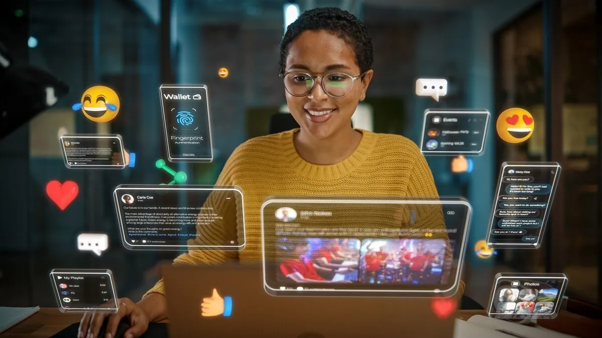 Person browsing on a laptop surrounded by overlapping app and notification windows.